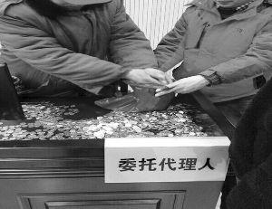 连云港男子因350元劳务款被告:当庭还一袋硬币