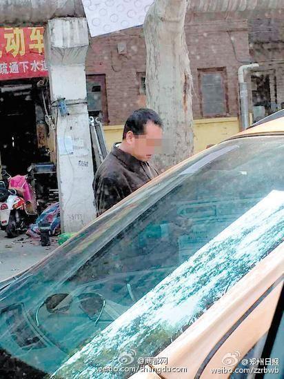 郑州一男子用钥匙划日系车 上写“中日友谊”