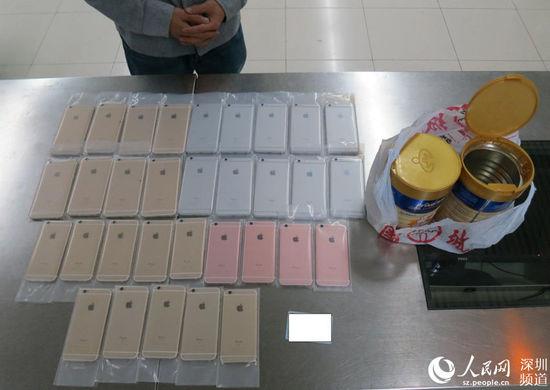 团伙用奶粉罐藏32台iPhone手机 走私入境被拦截