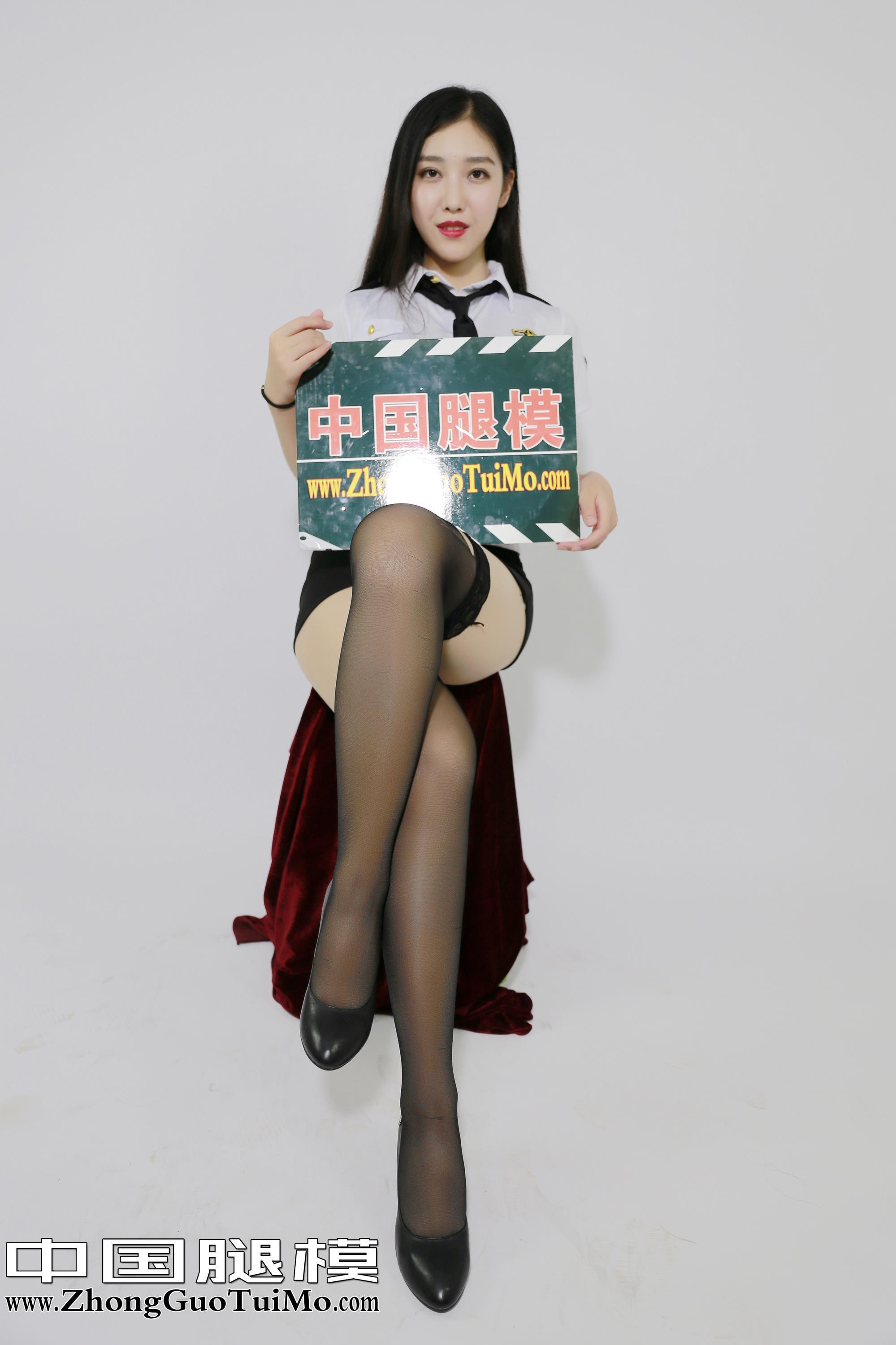 [中国腿模]No.025 小琦琦 性感女警制服与黑色包臀短裙加黑色丝袜美腿私房写真集,